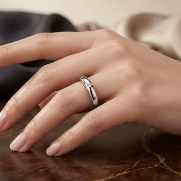 Close-up of a Glint ring on a hand